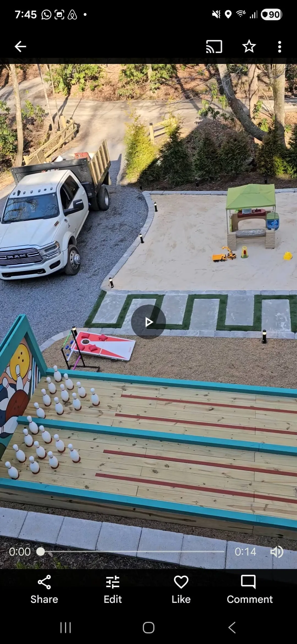 A vibrant outdoor area featuring a bowling alley, sandbox, playhouse, and toy vehicles, all brightly lit and designed for energetic play. The scene is packed with activities that cater specifically to children and family gatherings.